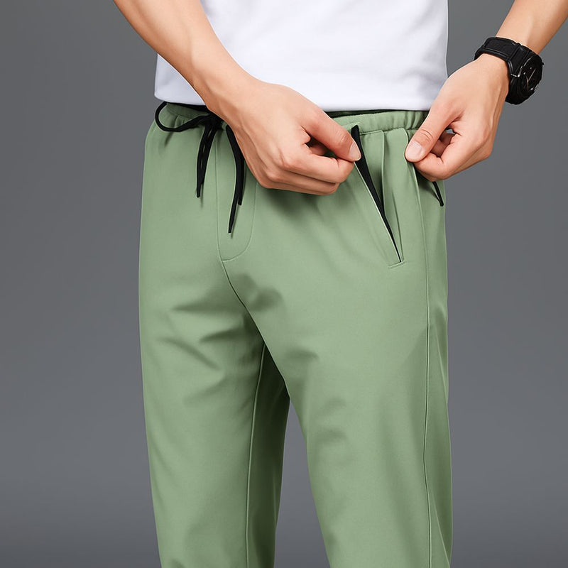 [Leve 3, Pague 2] Kit de 3 Calças Casuais Fly Comfort em Malha Tecnológica (A Única Que Despensa o Ferro de Passar!) + BRINDES: Cinto, Carteira e Relógio